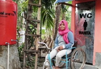 A Wheelchair and New Toilets for Ati